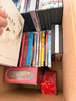 Box of DVDs and some CDs