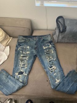 Ripped stacked jeans