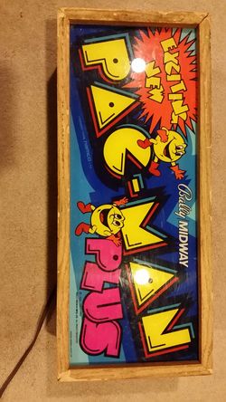 1980's arcade pac man plus sign.