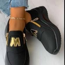 Women's Black Slip-On Sneakers with Gold Accent