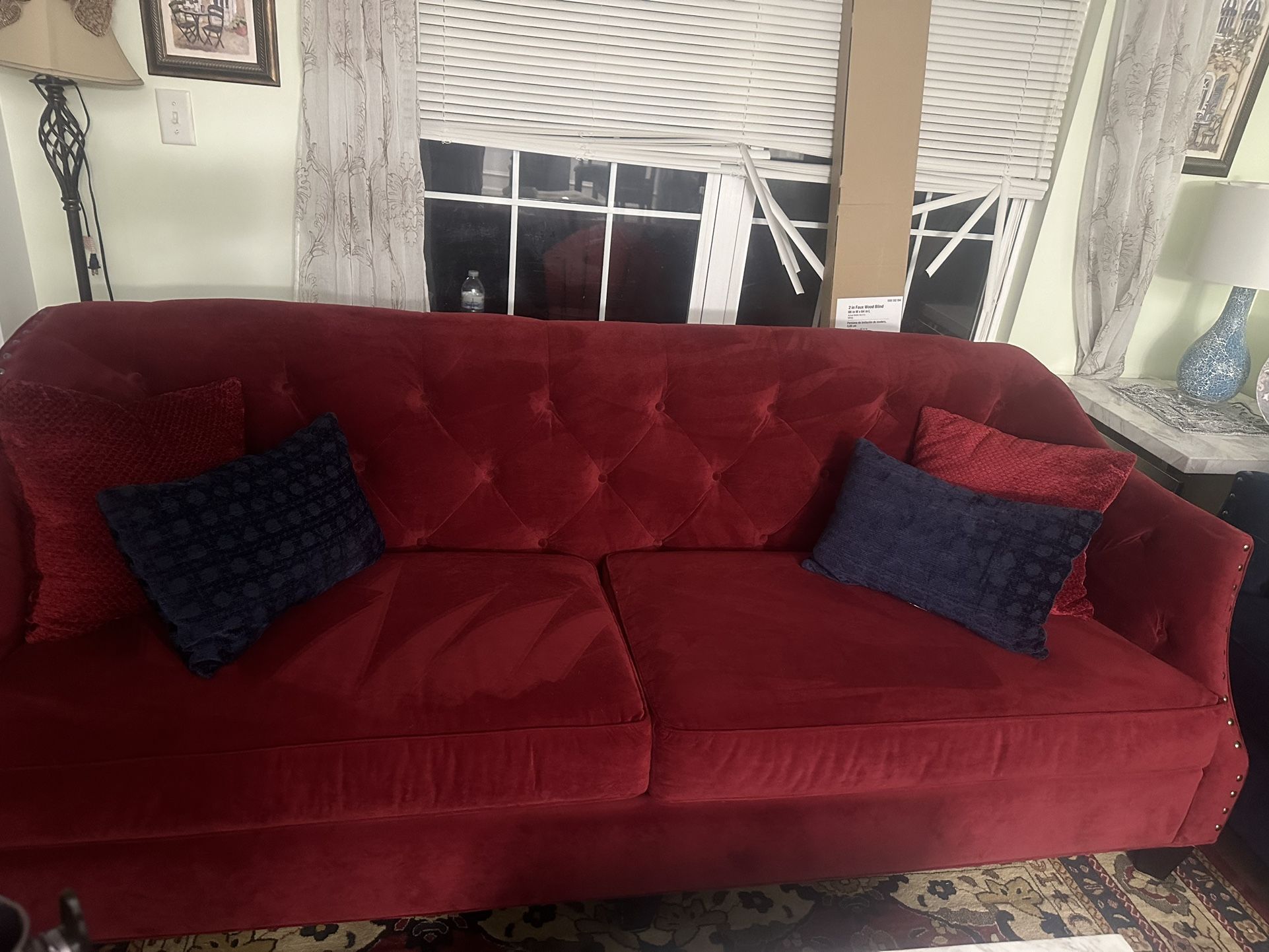 Two sofas in excellent condition, made of navy blue and burgundy velvet