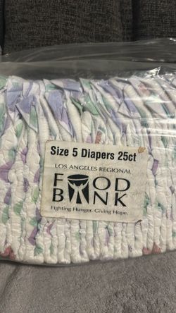 2 paquetes de Diapers nuevos size 5 $10 todo