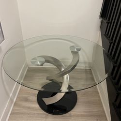 Glass top dining table 