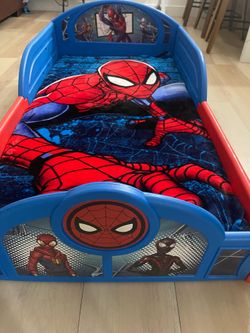 Used Spider-Man toddler bed with mattress for $50