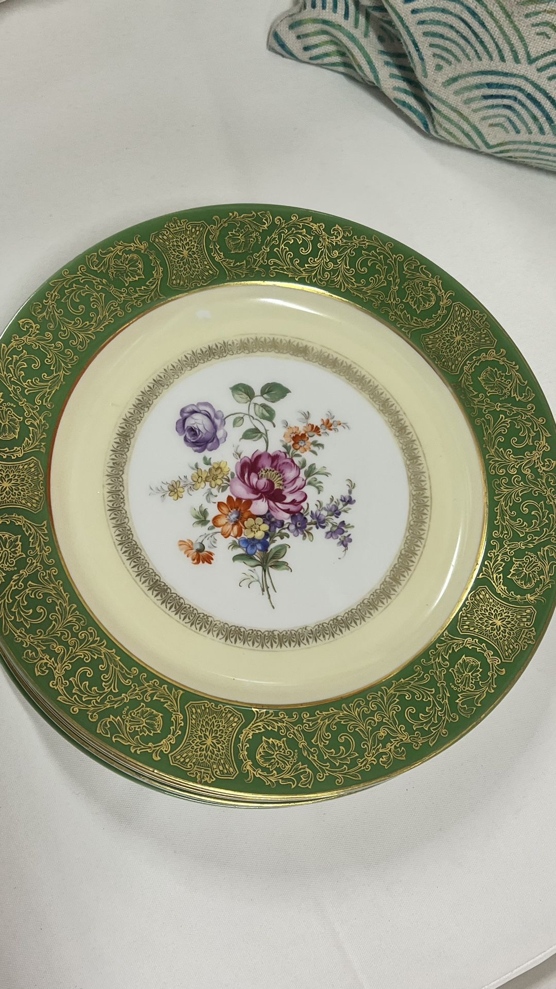 Beautiful antique green plates, decorated with floral and green and beige detailing