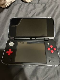 Nintendo 2ds XL Black/Red M*dded with games.