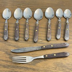  9 vtg Washington Forge Town & Country Stainless Wood Handles MCM spoons knives. DC photos for condition. They are showing their age some discoloratio
