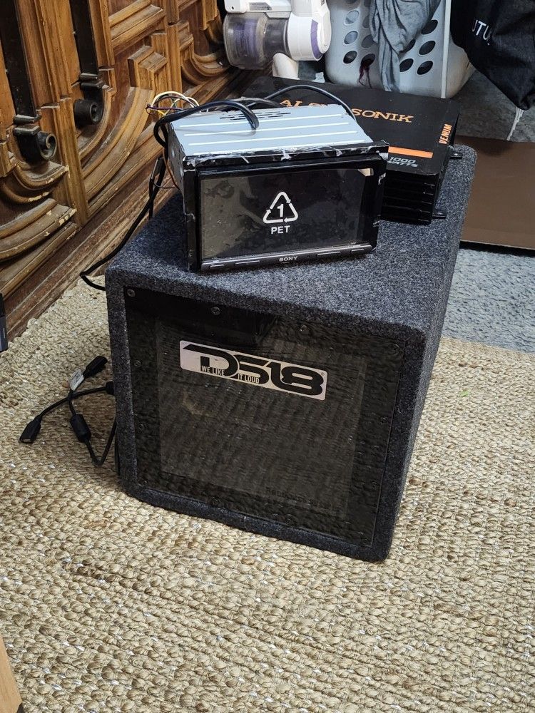 10w1v2-4 Jl Audio Subwoofer In A Bandpass Box 1000 Watt Alpasonik Amp And A Sony Single Din With 7inch Screen Xav5000