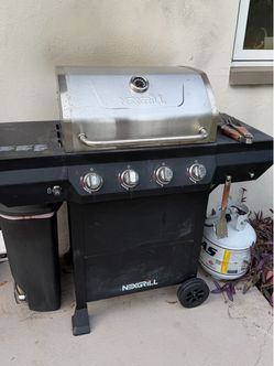 Nexgrill gas grill with Propane Tank and Utensils!