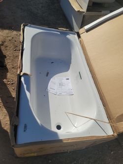 Bathtub tiny damage in corner