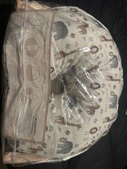 Nursing pillow with attachment