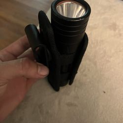 Flashlight And Holster. 