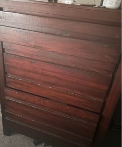 Dark Wood Dresser with Horizontal Slat Design