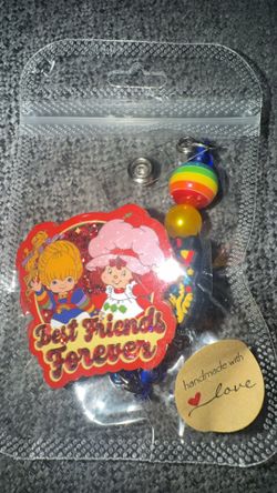 Rainbow brite & Strawberry shortcake badge drill