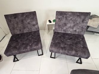 2 gray velvet like living room chairs seats in new condition