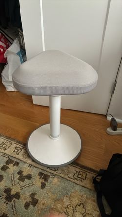 Height-adjustable desk stool