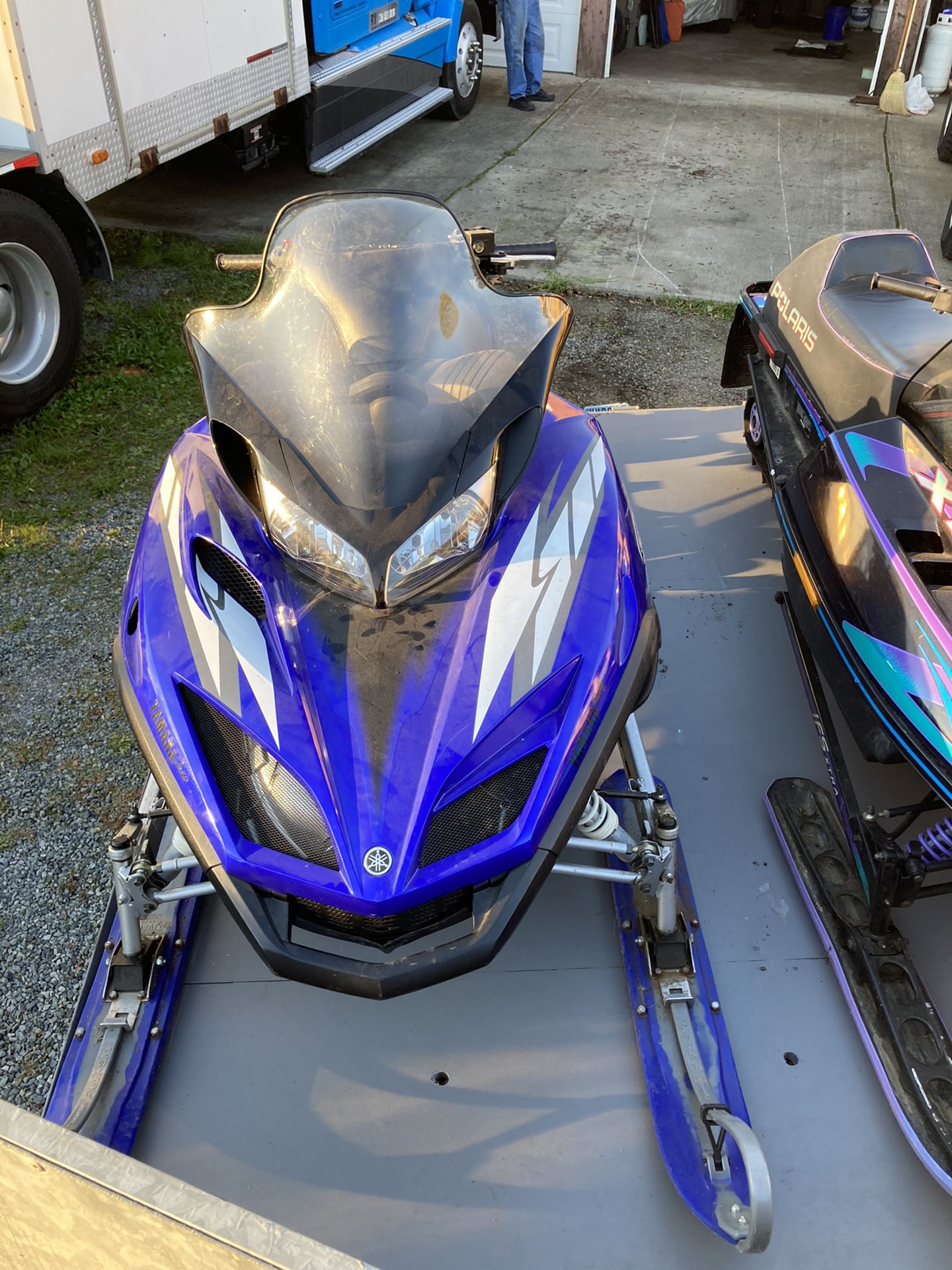 Snowmobiles and trailer