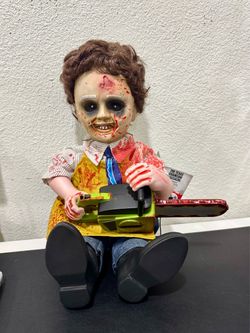Texas Chainsaw Massacre - Bloody Leatherface 12 inches tall sitting doll motion activated w/ chainsaw & light up eyes brand new! New w/ tag Horror