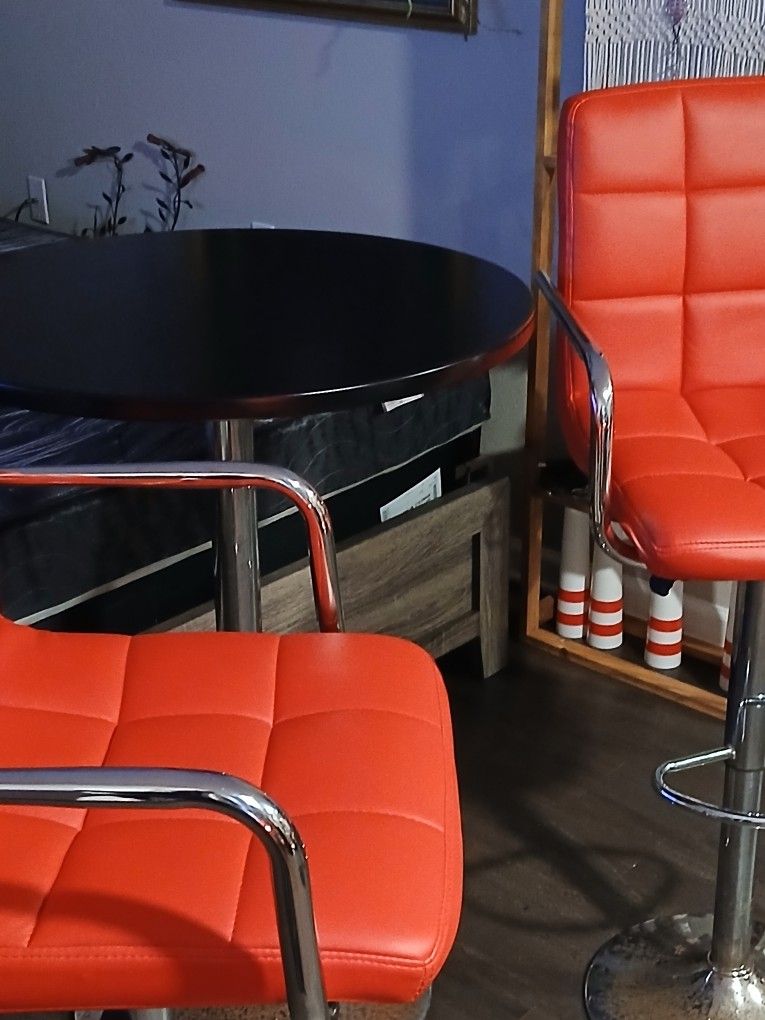 Cocktail Table With 2 RED SWIVEL CHAIRS