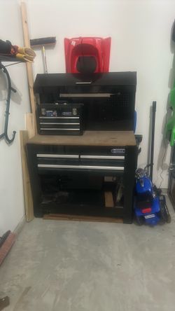 Kobalt tool bench with matching tool chest.