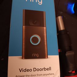 Ring video camera and stick up doorbell