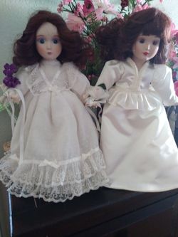 Vintage porcelain Dolls with stands
