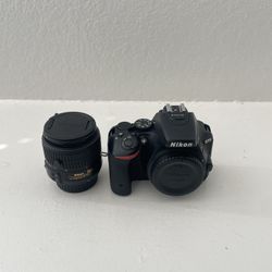 Nikon D5500 With 18-55mm 70-300, And Camera Strap