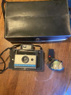 1960’s vintage Polaroid Land camera Auto 210 With Original Leather Case