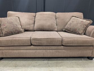 Spacious Brown Ribbed Fabric Sectional Sofa with Decorative Accent Pillow