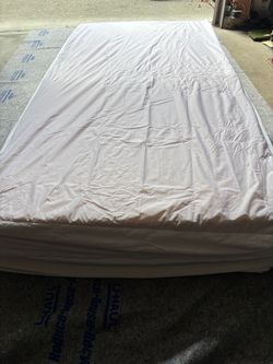 Mattress with White Protective Cover