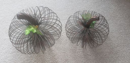 Two metal pumpkins