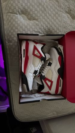 Red cement Jordan 4s
