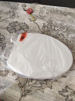 Toilet seat lid
