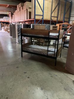 Twin bunk bed. Comes in espresso. Assembly required. Assembly not included. Taxes included. Free delivery.  Bunk bed only-$220 Bunk bed with mattresse