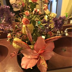 Decorative Artificial Flowers Arrangement In Beautiful Pot.