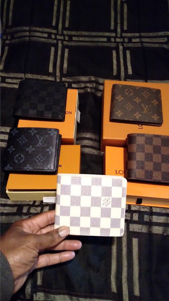 Desinger Wallets In Box..$40 Each