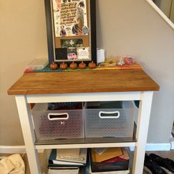 Versatile wood and stainless steel wheeling table