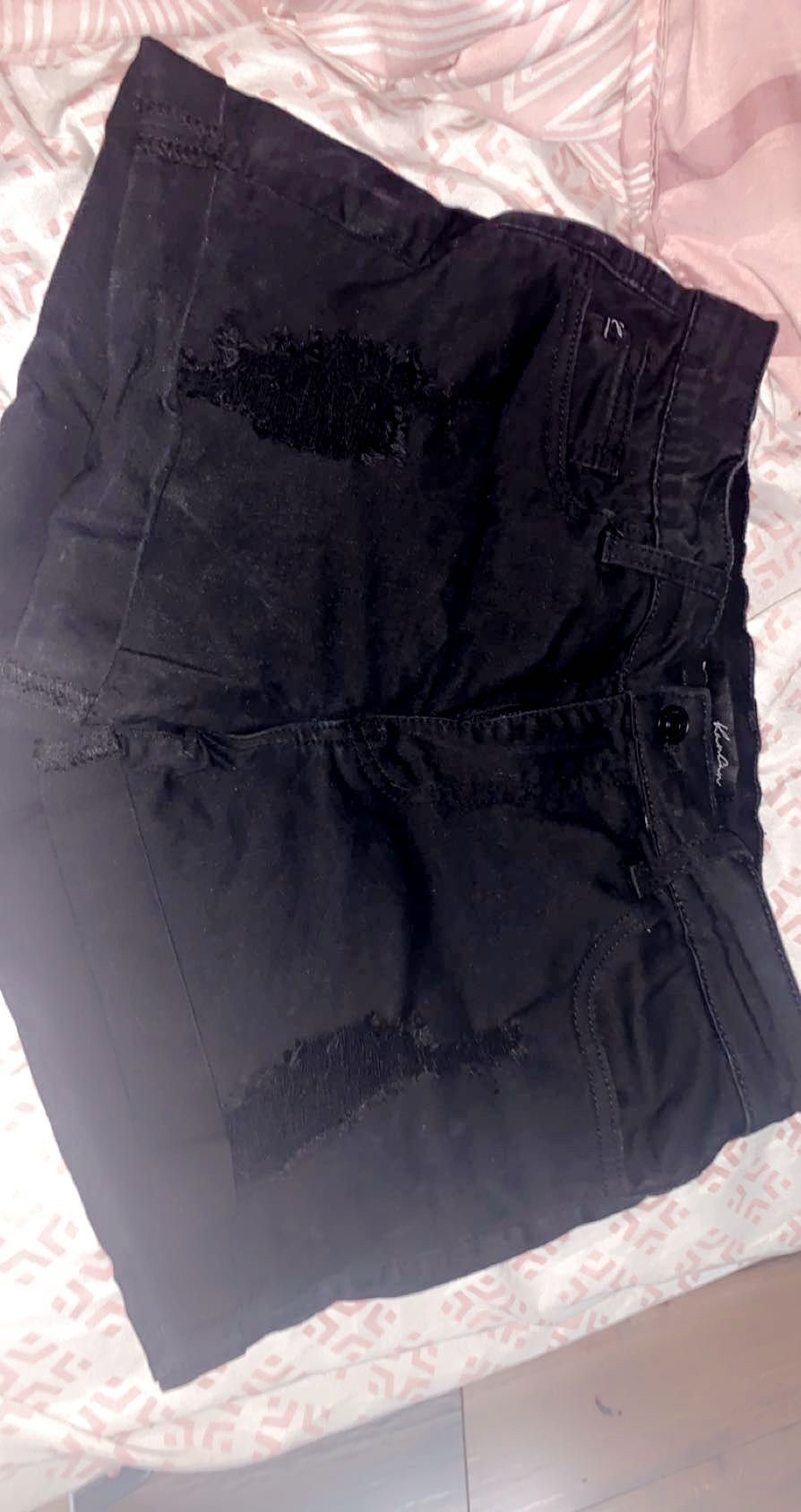 Black ripped shorts