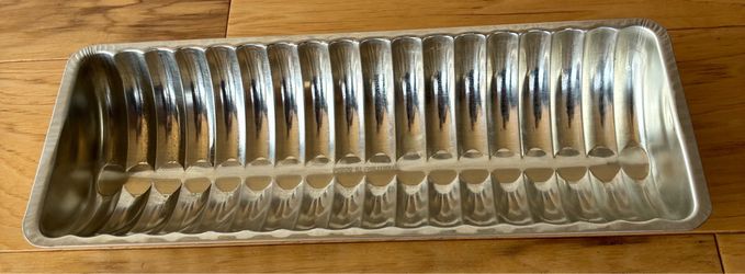 Almond cake mold pan, Made in Germany, 4 3/4”X12 1/4”.