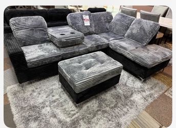 New black and grey sectional with storage ottoman and free delivery, pay on arrival