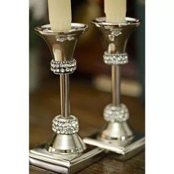 Classic Pair of Stainless Steel Candle Holders with Crystal Diamond Design.
Versatile can accommodate various size candles. 12" Tall. Base 4".

