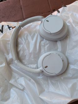 Sony WH-CH720N wireless noise-canceling headphones in white.