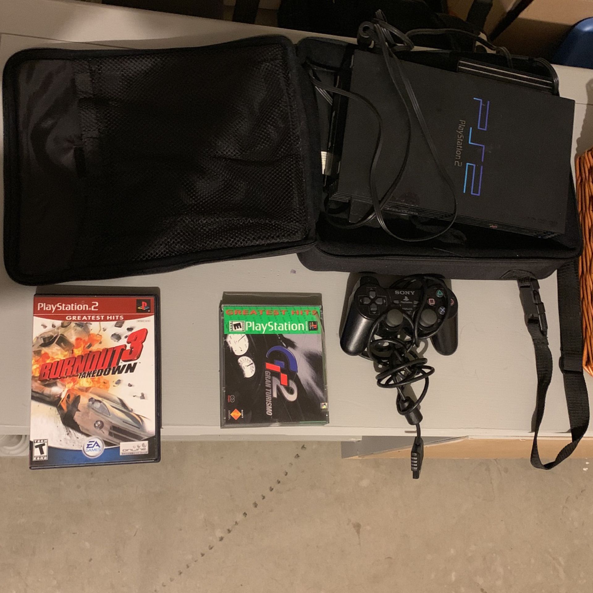 PS2 + Controller And 2 Games