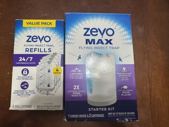 Zevo flying insect trap. 1 device and 4 total cartridges. Used once 