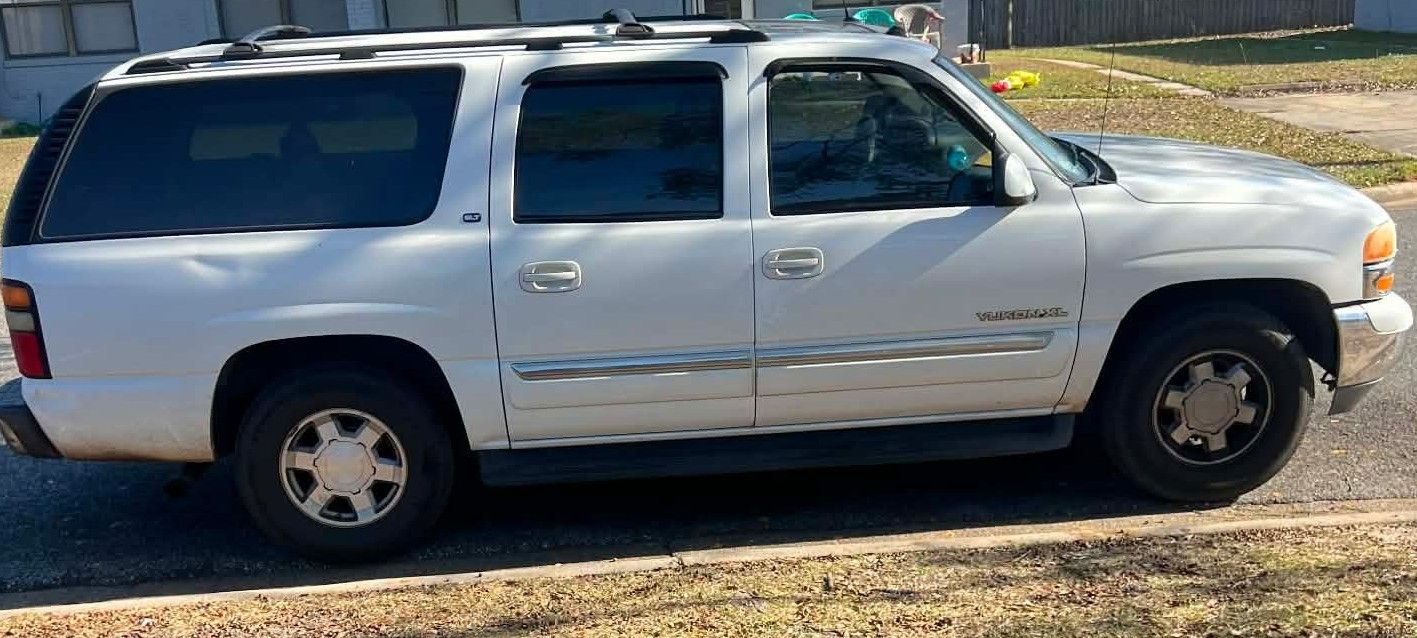 GMC YUKON Al / 2014 Dodge Charger