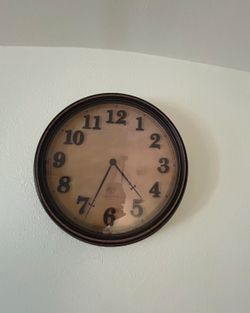 Brown wall clock