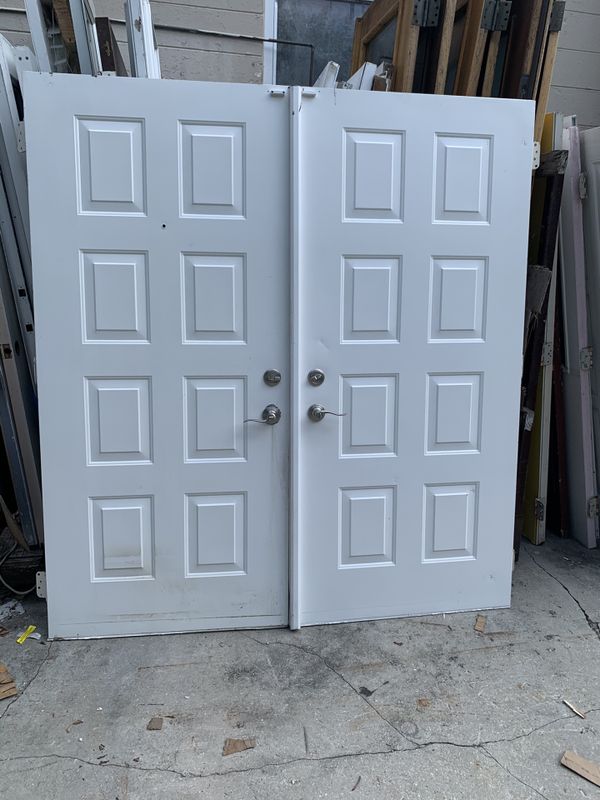 Used double door exterior metal 72x80 for Sale in Pompano Beach, FL