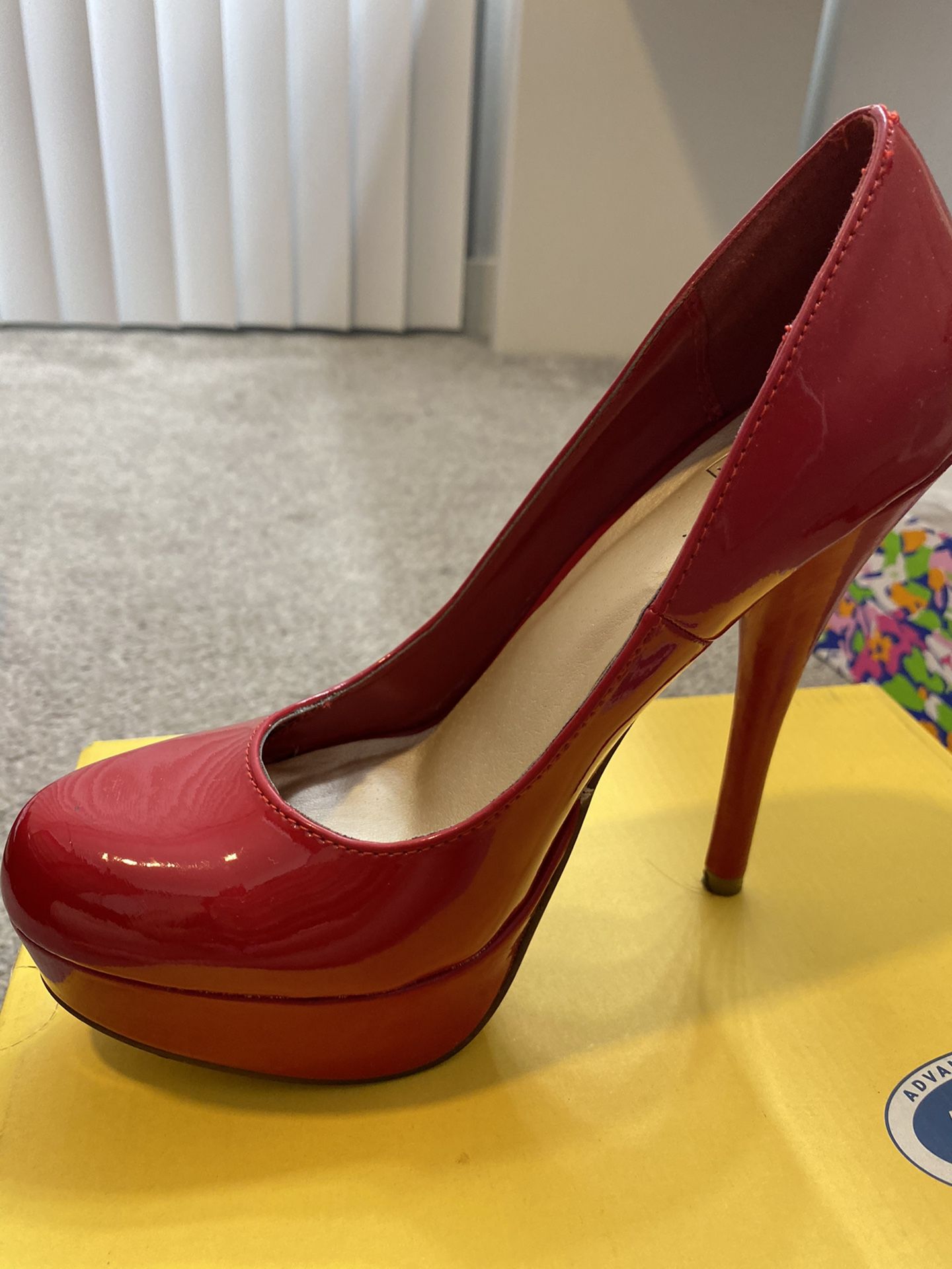 Red shiny heels