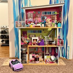 Barbie wooden doll house with toys