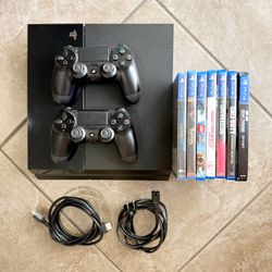 PlayStation 4 (PS4) with 500 GB Hard Drive + Multiple Games
